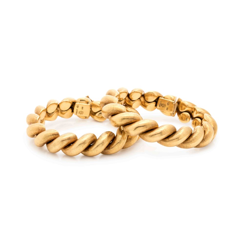 Appraisal: PAIR OF YELLOW GOLD BRACELETS PAIR OF YELLOW GOLD BRACELETS