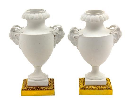 Appraisal: A Pair of French Gilt Bronze Mounted Bisque Porcelain Urns