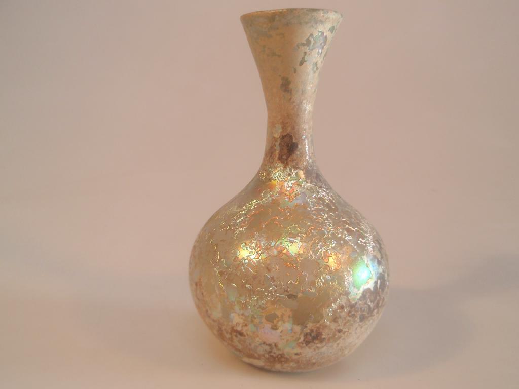 Appraisal: A Roman light green glass flask the funnel mouth with