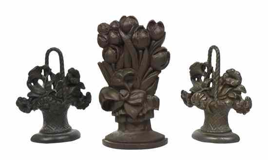 Appraisal: A Group of Three Cast Iron Fireplace Medallions each depicting