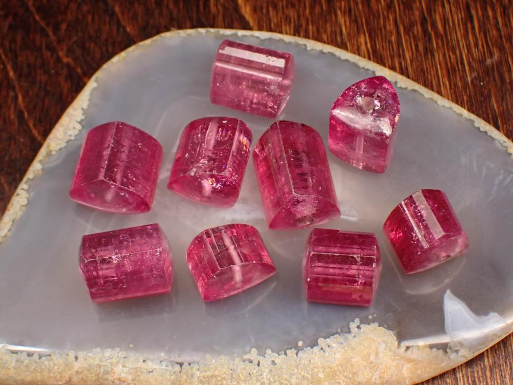 Appraisal: COLLECTION OF NINE PINK TOURMALINE BEADS including nine chunky faceted