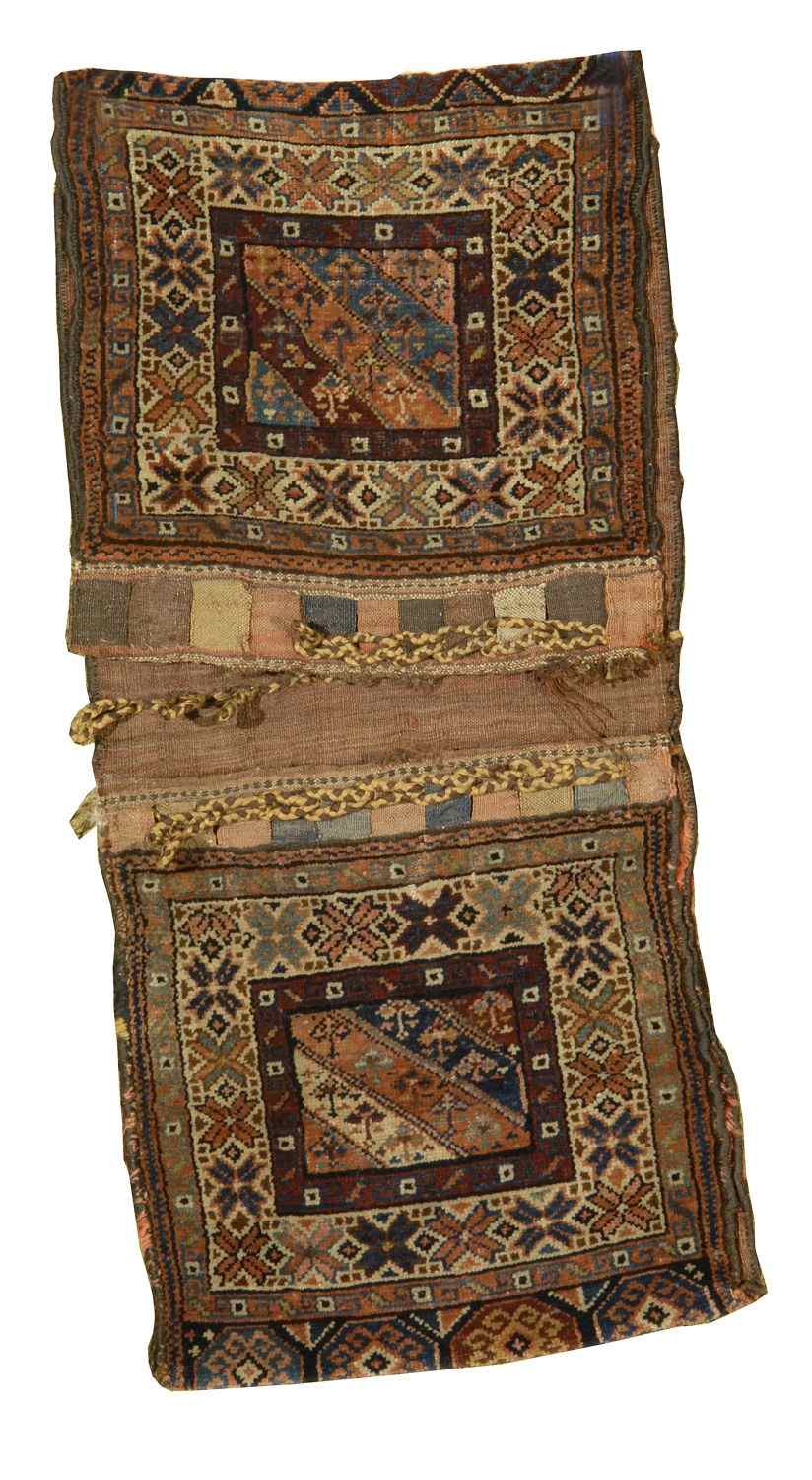 Appraisal: ORIENTAL RUG PAIR OF BELOUCH SADDLE BAGS ' x '