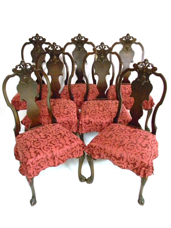 Appraisal: Seven Georgian style chairs with carved pierced crests vertical splat