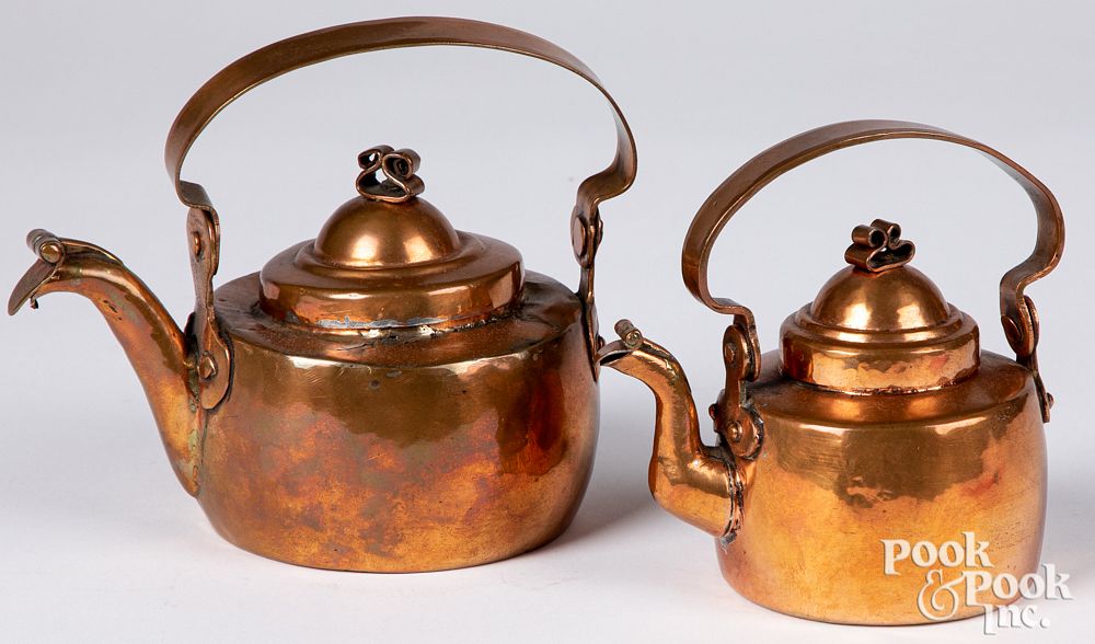 Appraisal: Two small dovetailed copper kettles th c Two small dovetailed