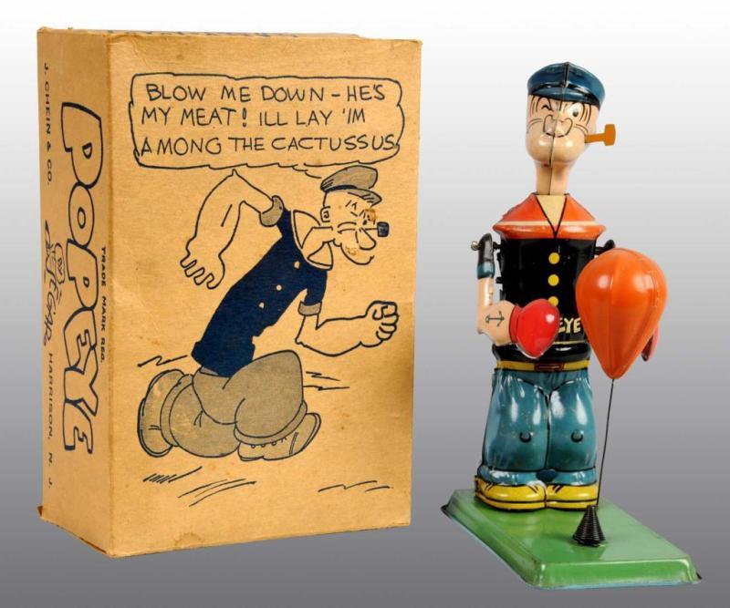 Appraisal: Chein Popeye Floor Puncher Toy in Orig Box Description Tin