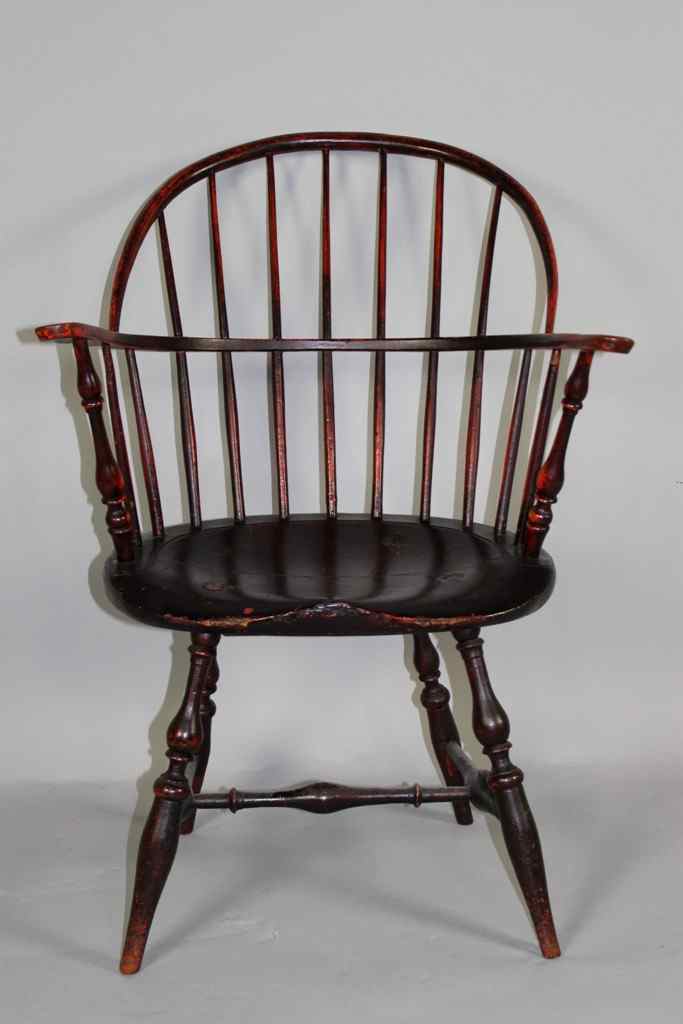 Appraisal: NEW ENGLAND BLACK PAINTED SACK BACK WINDSOR ARM CHAIR early