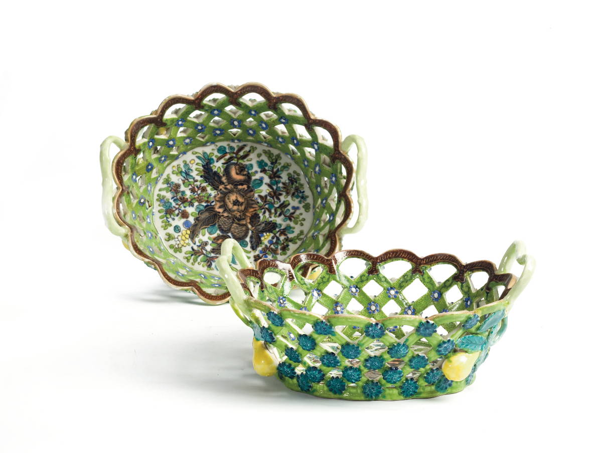 Appraisal: PAIR OF PORCELAIN RETICULATED CHESTNUT BASKETS Each painted in the