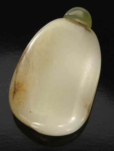 Appraisal: Chinese Qing carved pebble jade snuff bottle ''H Circa -