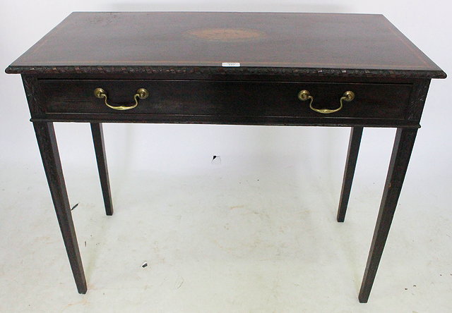 Appraisal: A REPRODUCTION MAHOGANY SIDE TABLE with husk tail carved decoration