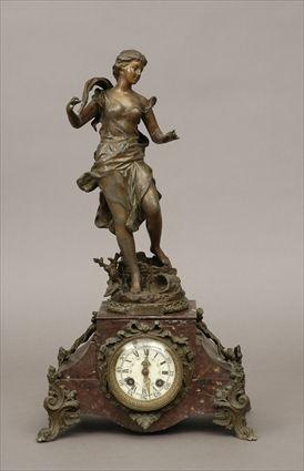 Appraisal: French Patinated Metal and Marble Mantel Clock with Figure Titled