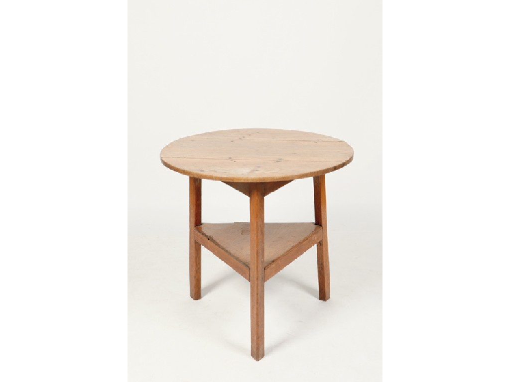 Appraisal: HEALS A LIGHT OAK CRICKET TABLE the circular three plank