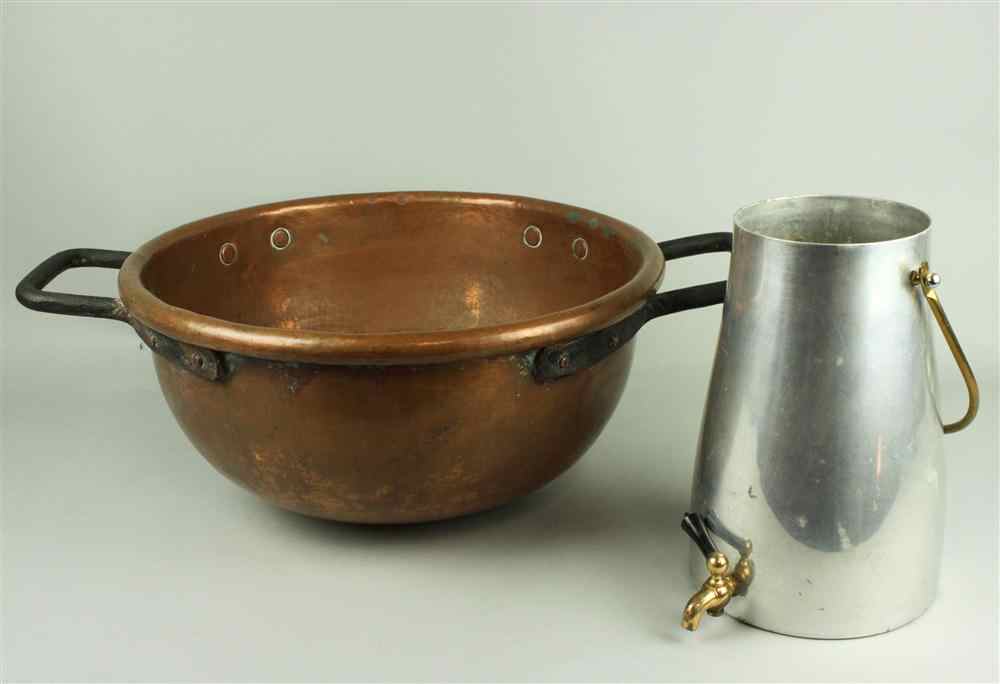 Appraisal: COPPER TWO-HANDLED CAULDRON AND WATER CISTERN Dia of cauldron in