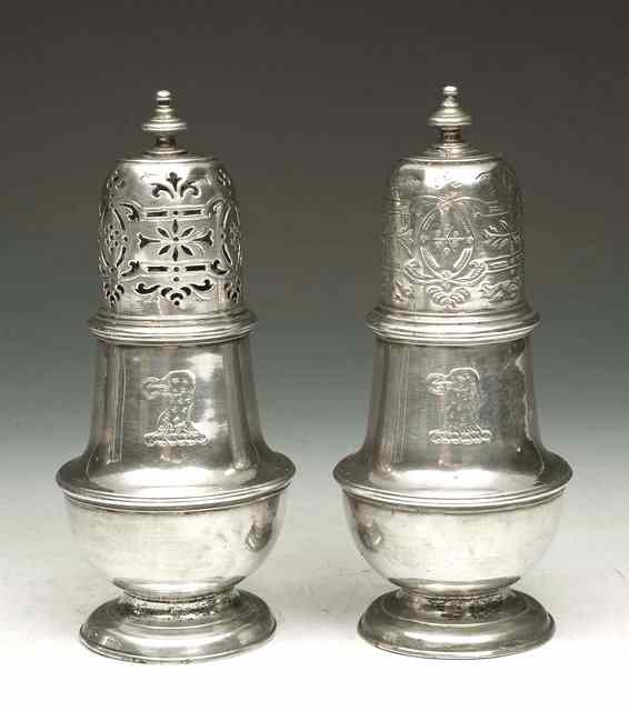 Appraisal: A PAIR OF GEORGE II CASTORS of baluster form standing