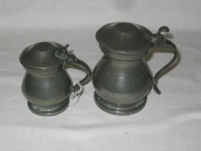 Appraisal: TWO PEWTER MEASURES of half pint and gill capacity the