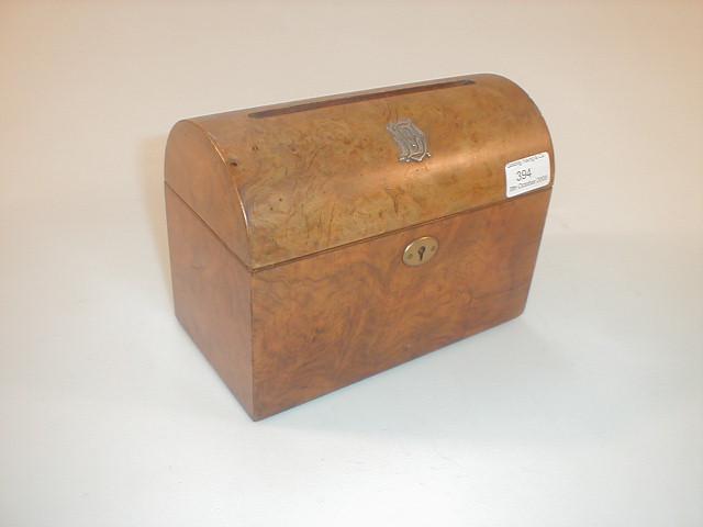 Appraisal: A Victorian figured walnut domed topped letter box with hinged