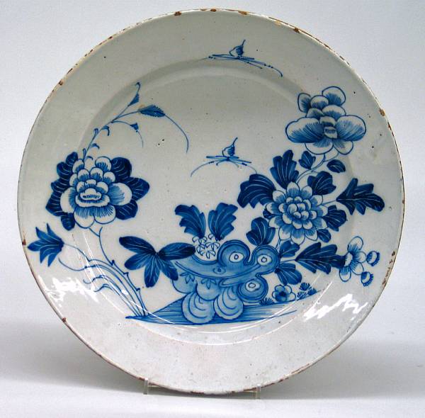 Appraisal: An English Delft chinoiserie charger mid- th century The dished