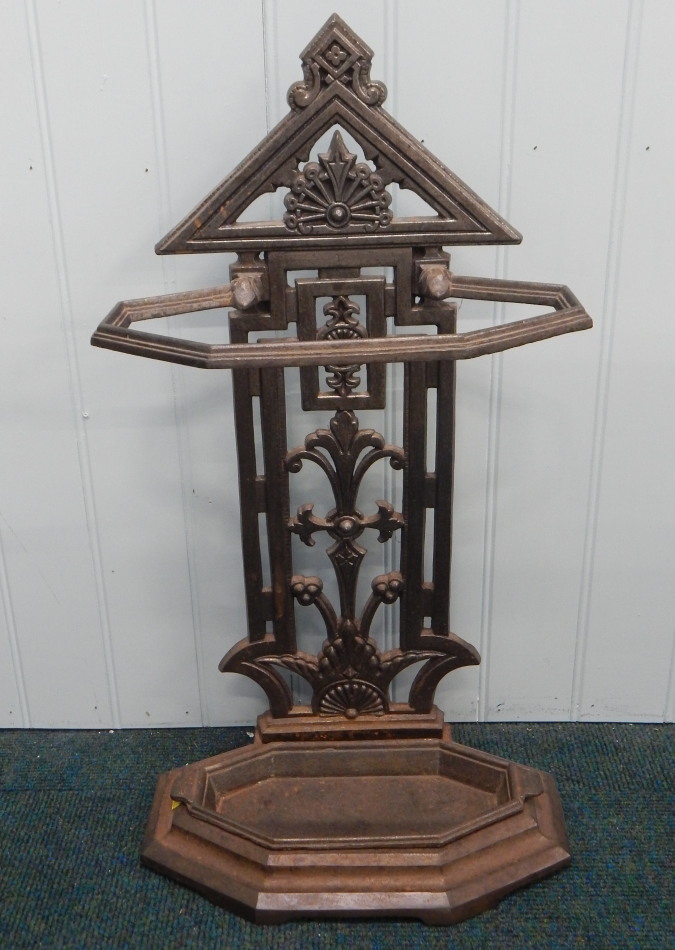 Appraisal: A Victorian cast iron umbrella stand decorated with fans leaves