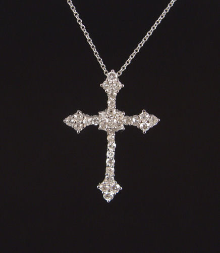 Appraisal: PLATINUM DIAMOND CROSS PENDANT Platinum cross pendant contains round single