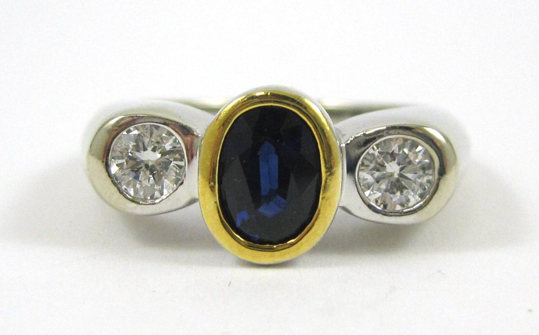 Appraisal: SAPPHIRE DIAMOND AND FOURTEEN KARAT GOLD RING The white and