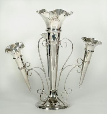 Appraisal: AN EPERGNE Walker Hall Sheffield the central frilled trumpet on