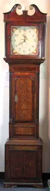 Appraisal: A thirty-hour oak longcase clock with square panelled dial signed