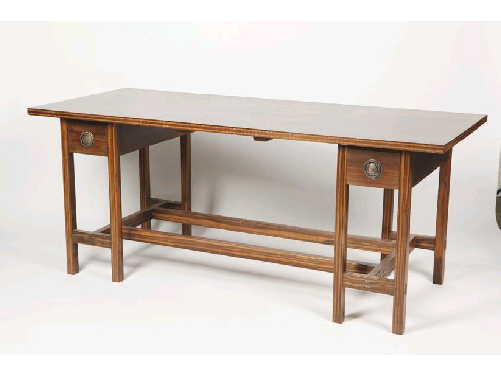 Appraisal: ERNEST W GIMSON A MACASSAR EBONY LIBRARY TABLE the rectangular