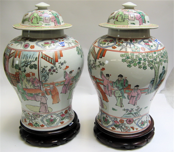 Appraisal: PAIR CHINESE COVERED TEMPLE JARS hand painted porcelain with figures