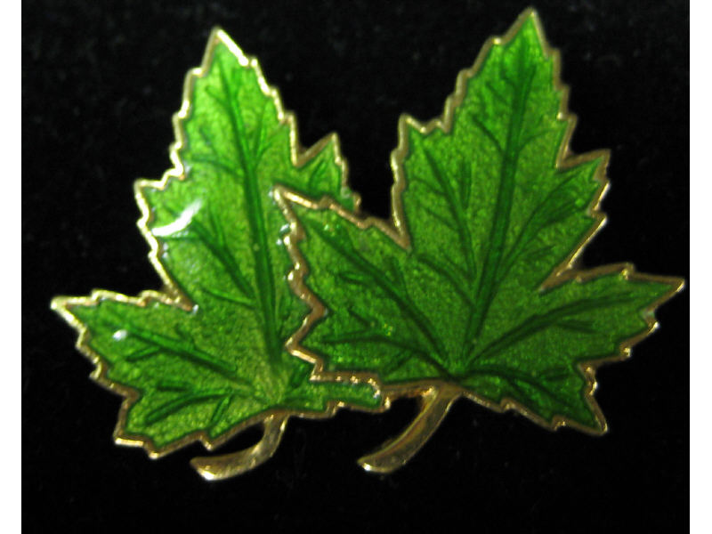 Appraisal: MAPLE LEAF BROOCH k yellow gold double maple leaf design