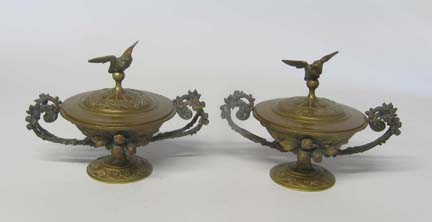 Appraisal: Pair of bronze covered urns late th early th century