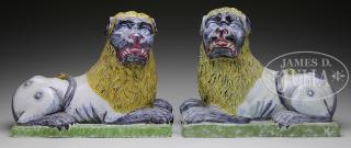 Appraisal: PAIR OF LUNEVILLE FAIENCE RECUMBENT LIONS Rare pair of Luneville