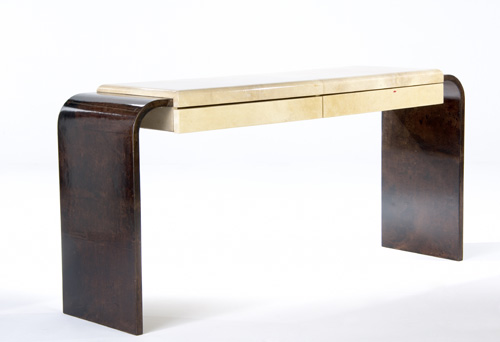 Appraisal: KARL SPRINGER Two-drawer console covered in ivory and brown lacquered