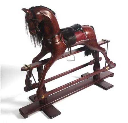 Appraisal: A late th century rocking horse with black mane and