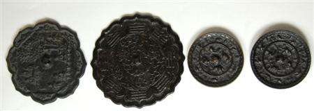 Appraisal: A Chinese bronze mirror probably Tang Dynasty of circular floriate