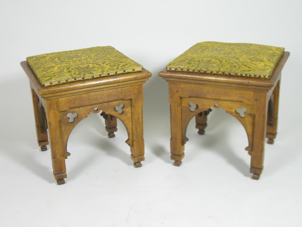 Appraisal: Pair of th Century Gothic oak Stools having pierced tracery