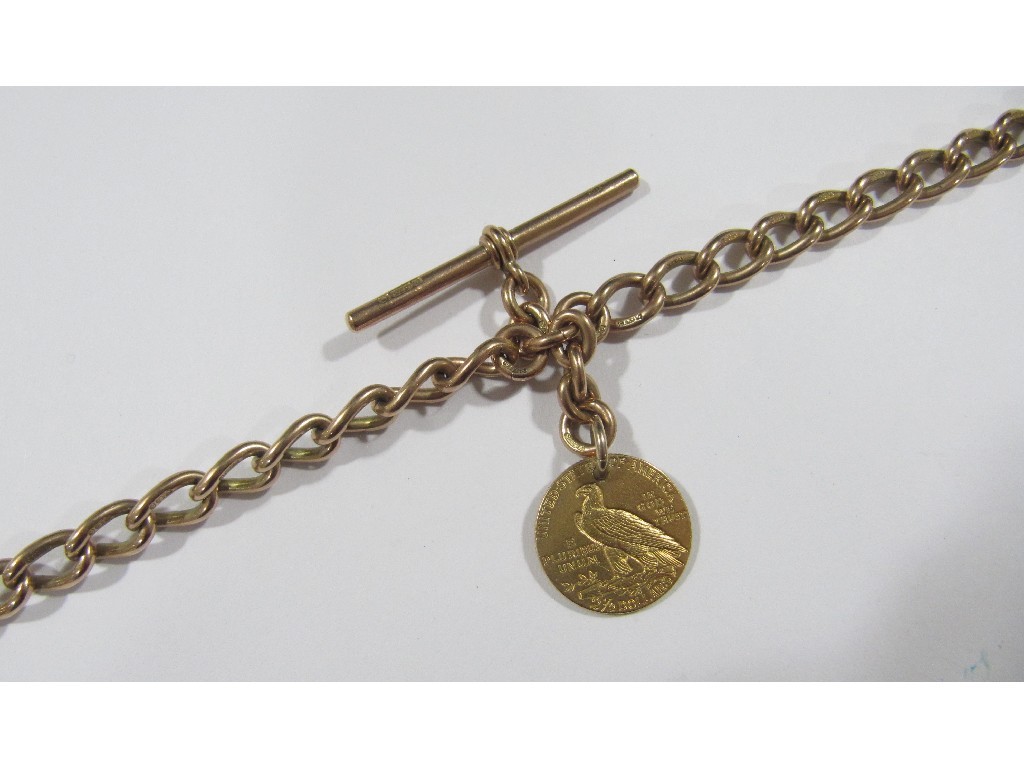 Appraisal: Nine carat gold curb link Albert chain with gold dollar