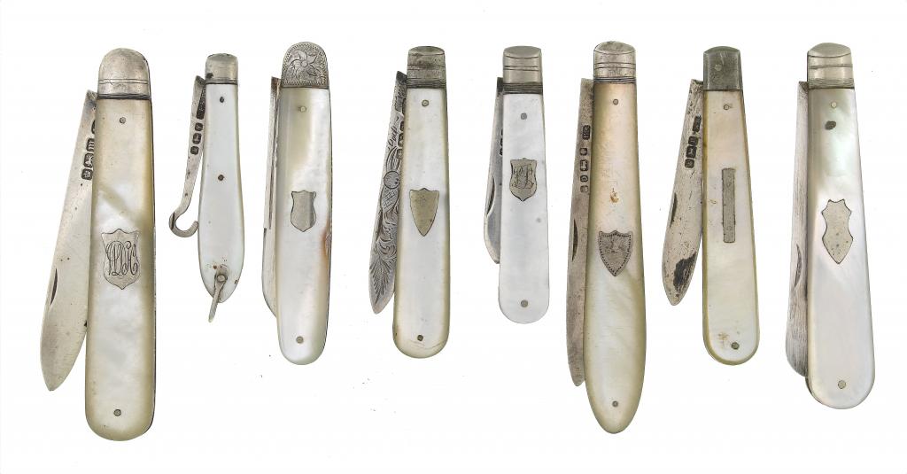 Appraisal: SEVEN SILVER FRUIT KNIVES including an example with hooked blade