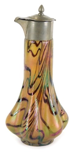 Appraisal: A Loetz style glass jug on a lustre ground with