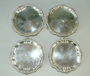 Appraisal: A set of four George I Irish silver waiters Dublin