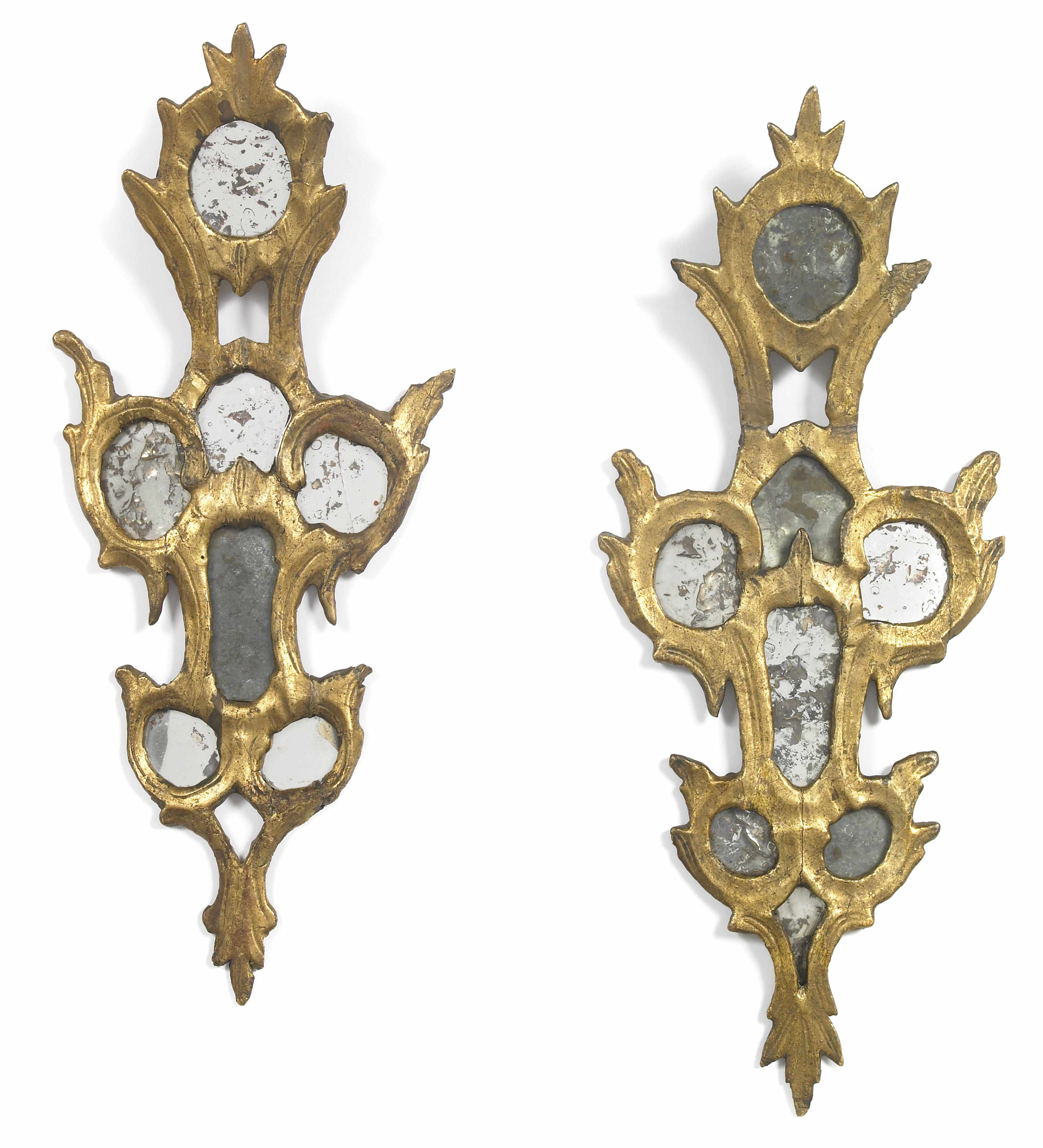 Appraisal: A pair of Italian Rococo giltwood mirrors second half th