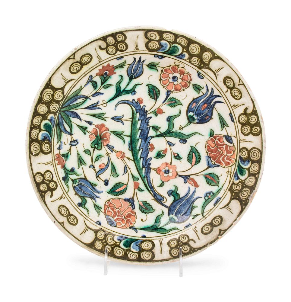 Appraisal: An Iznik Pottery Charger An Iznik Pottery Charger Ottoman Turkey