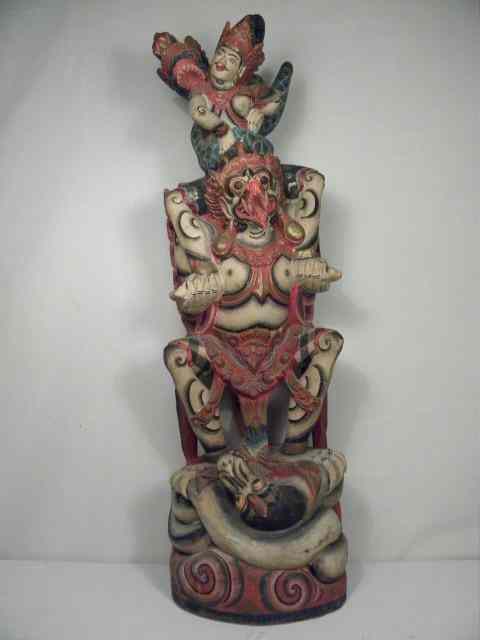 Appraisal: Bali painted wood carving depicting Lord Wisnu riding on his