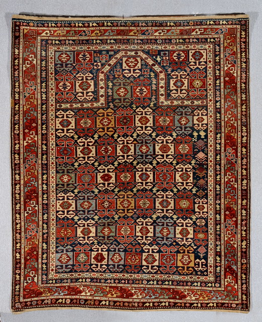 Appraisal: AN ANTIQUE SHIRVAN MARASALI PRAYER RUG with a central alternating