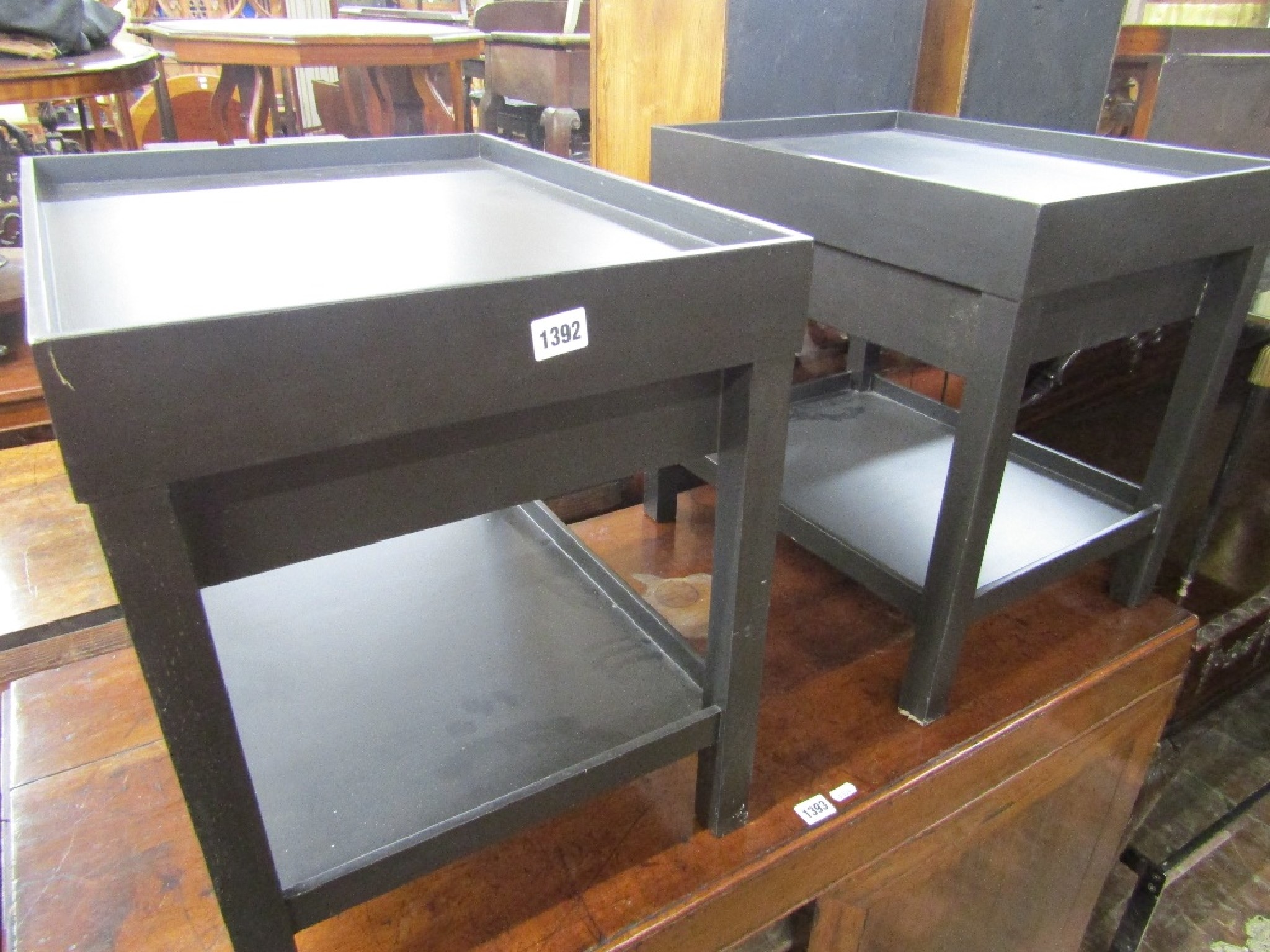 Appraisal: A pair of contemporary occasional tables of rectangular form on