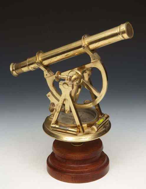 Appraisal: A TH CENTURY BRASS THEODOLITE the platform with silvered compass