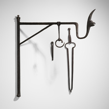 Appraisal: Samuel Yellin attribution WALL-MOUNTED KETTLE HOOK AND FIRE TONGS FROM