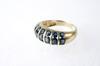 Appraisal: LADY'S RING - One K yellow gold channel set sapphire