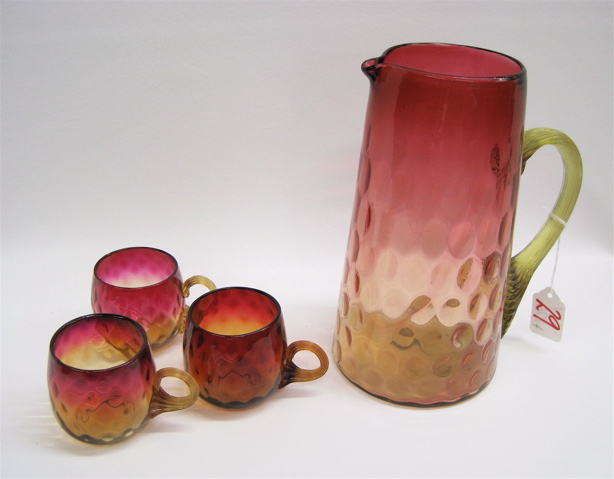 Appraisal: AMBERINA GLASS PITCHER AND TREE CUPS pieces All with yellow