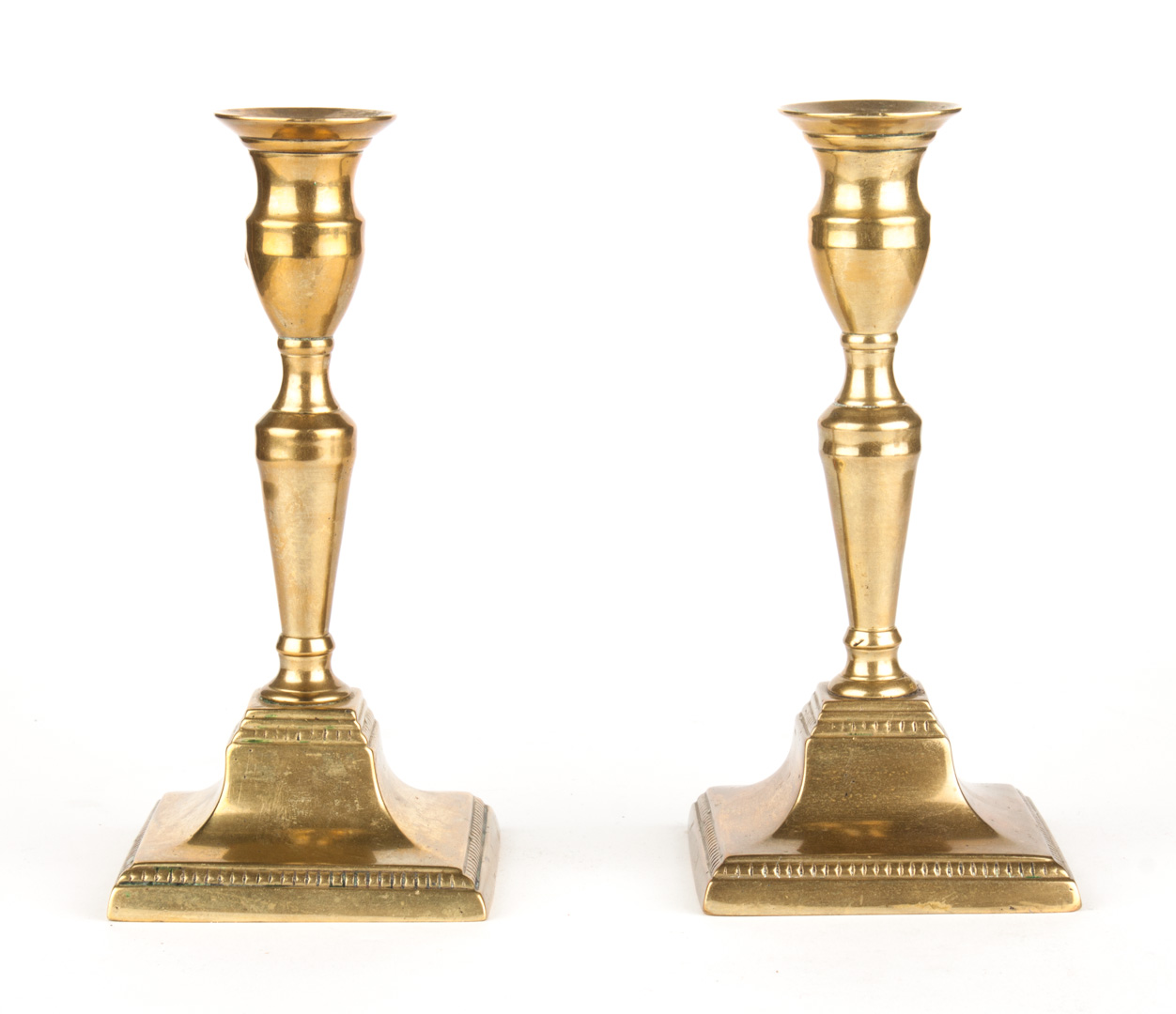 Appraisal: Pair of George III brass candlesticks circa square bases in