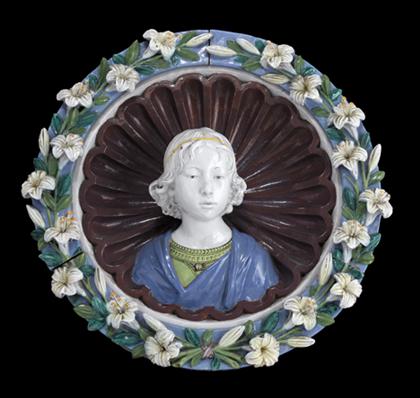 Appraisal: Italian Della Robbia style maiolica tondo Centered by a relief