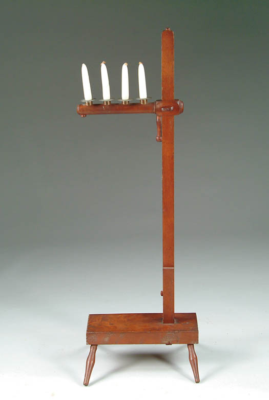 Appraisal: INTERESTING FLOOR ADJUSTABLE WOOD CANDLESTAND The cricket style Windsor base